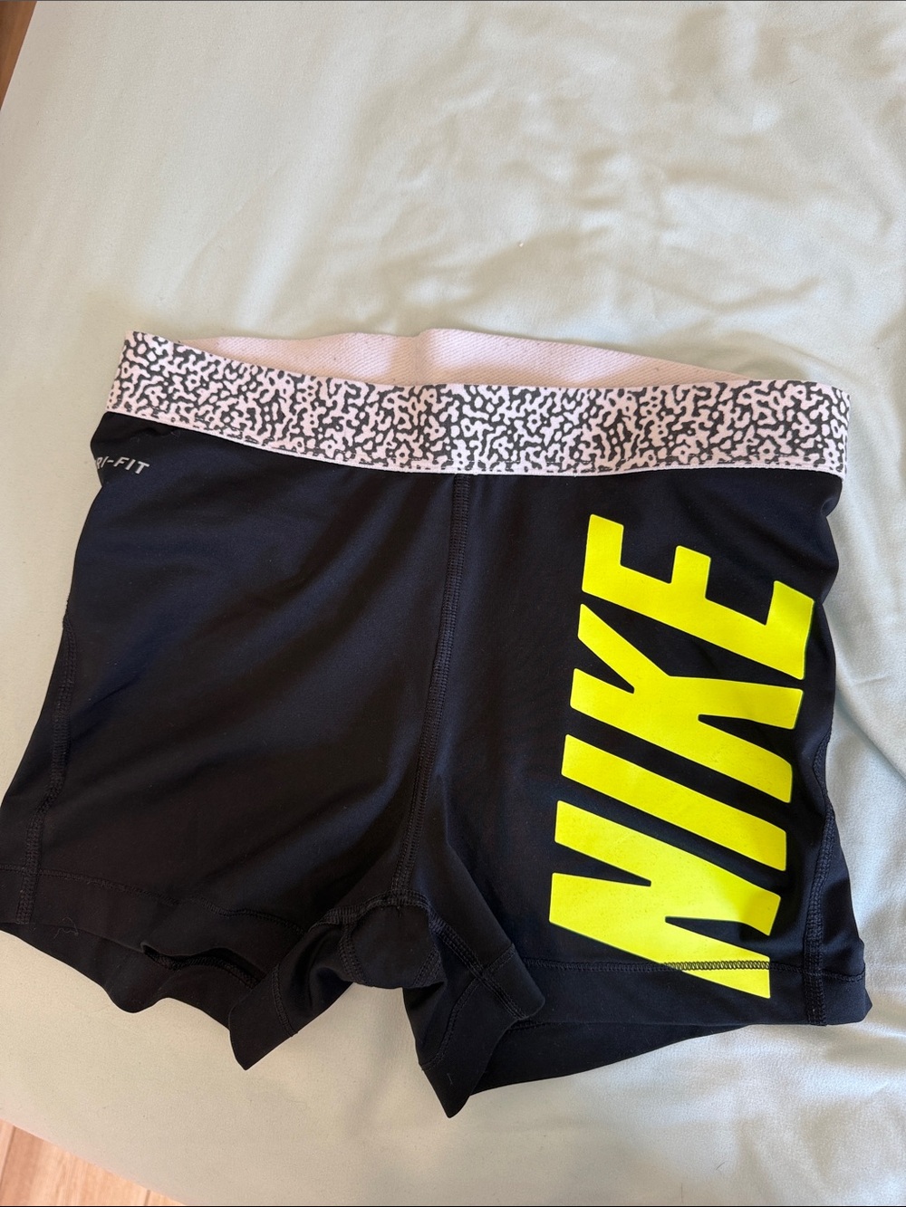 Nike Women’s Black Dri-FIT Performance Shorts with Neon Yellow Logo
